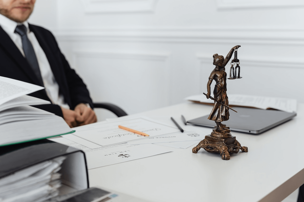 A lawyer behind his desk