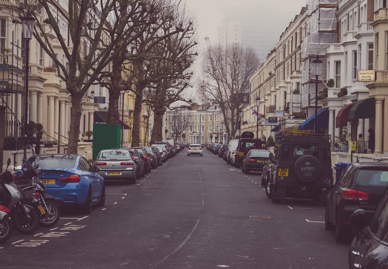 A street full of parked cars