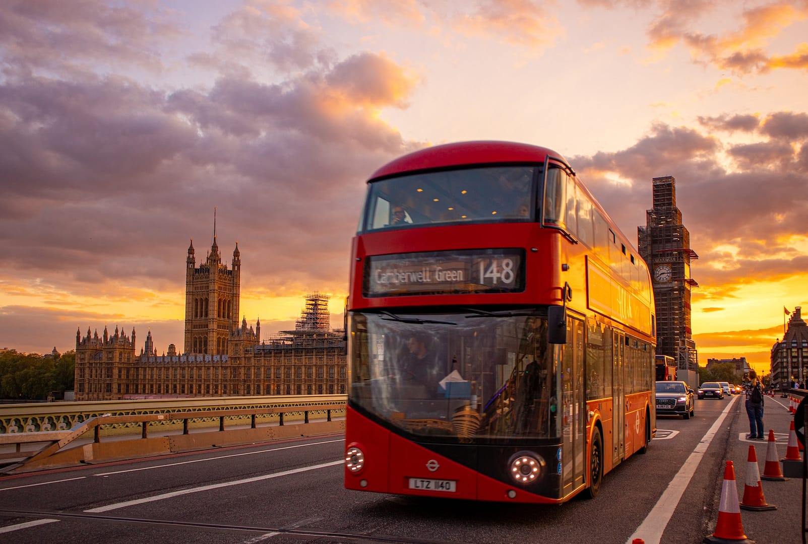 a bus passing the houses of parliament
