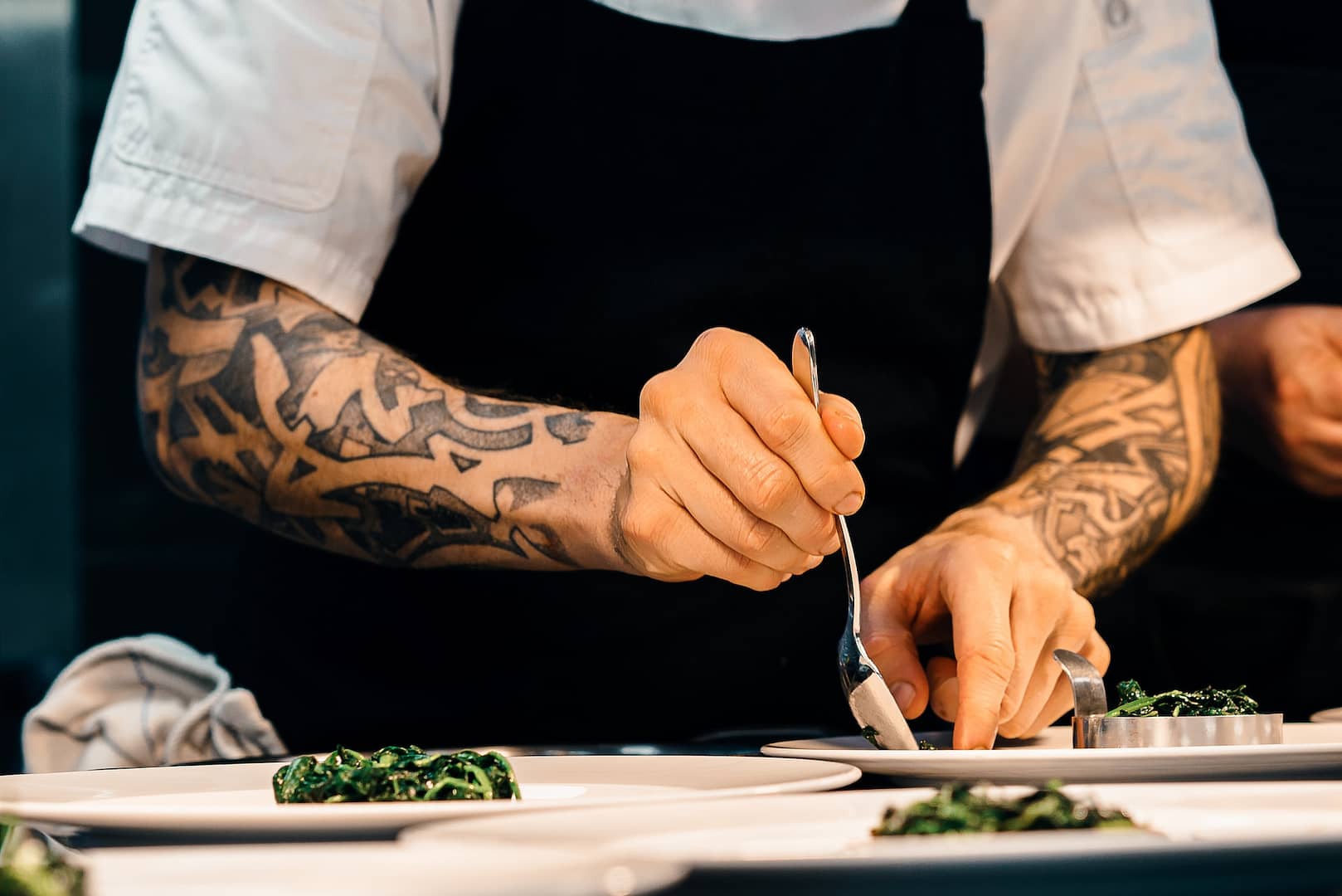 A chef plating up food