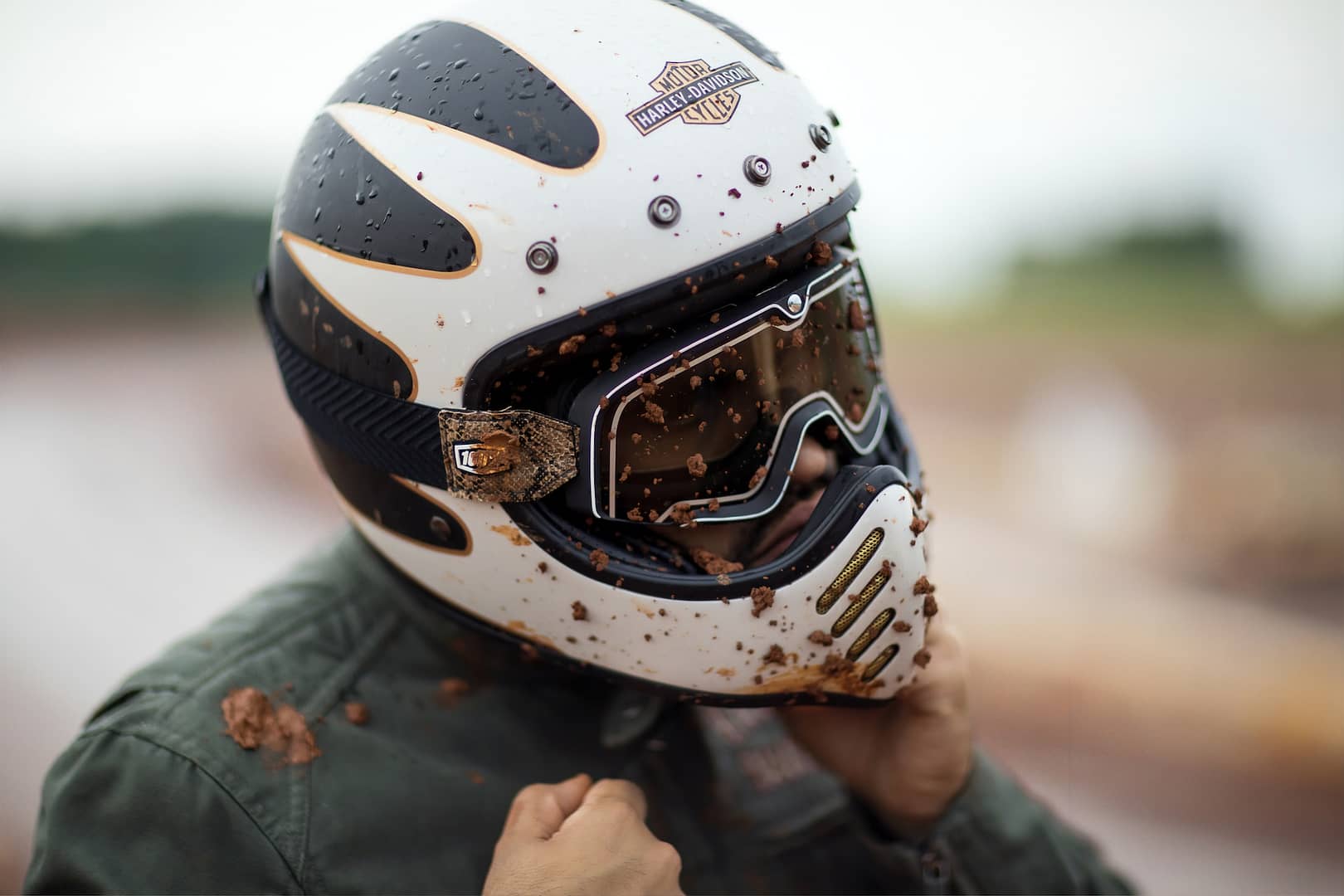 A muddy motorbike helmet