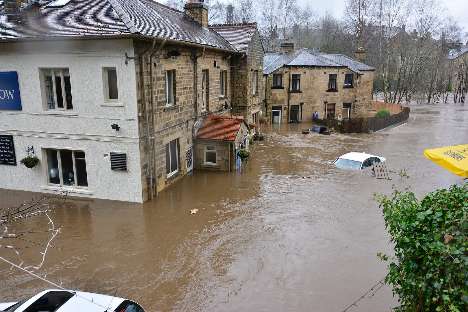 Houses and cars submerged in a flood