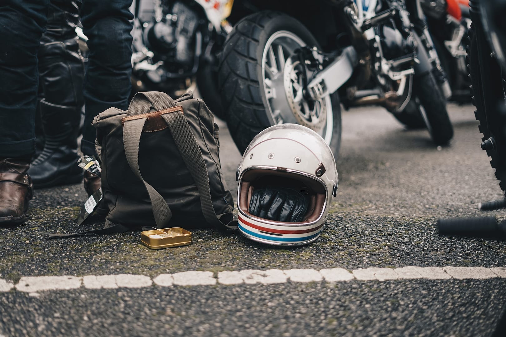 A motorbike helmet on the pavement