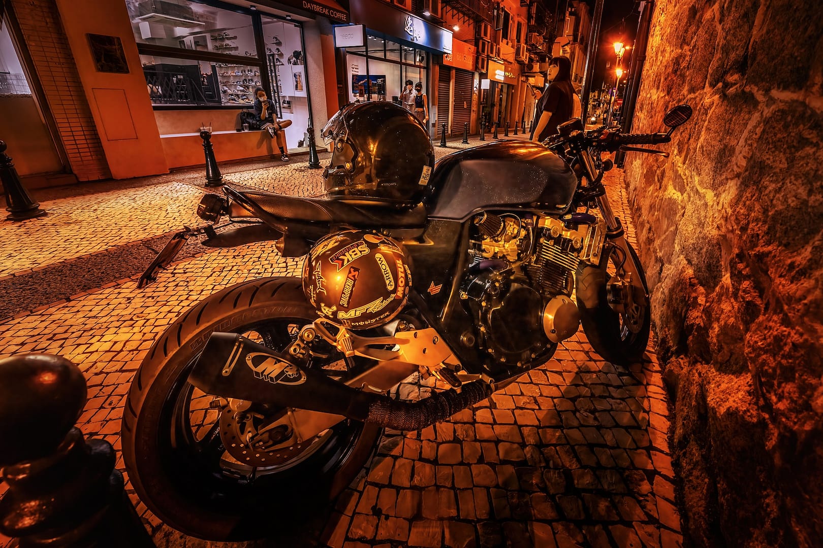 A parked motorbike at night