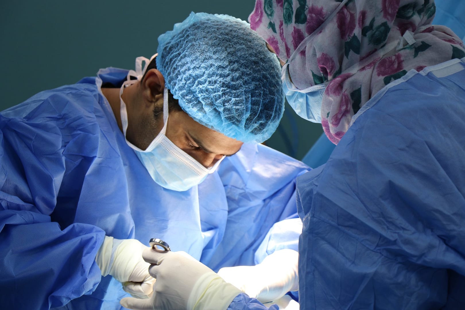 A doctor carrying out a surgery