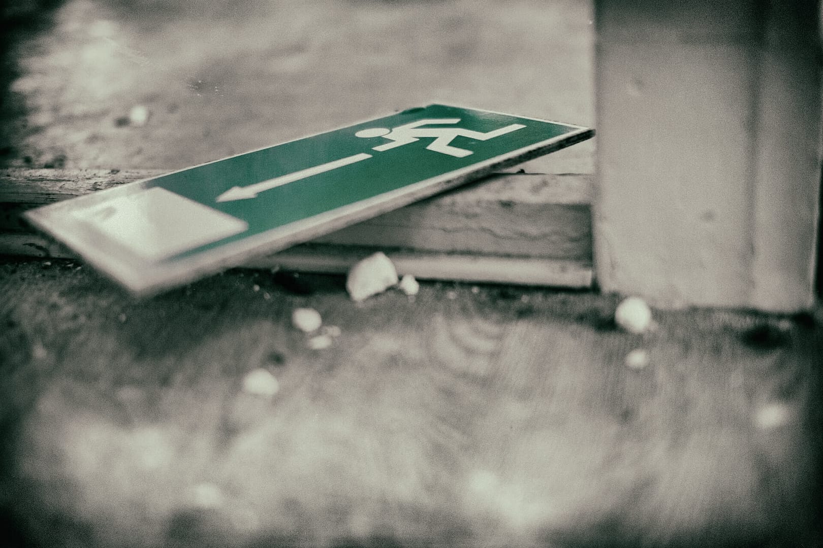 A fire exit sign on the ground