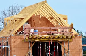 A house with a roof under construction