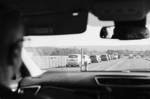 Black and white photo of busy road