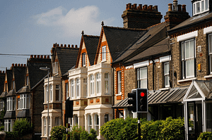 row of houses next to a busy street