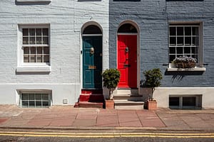 A red door and blue door next to each other
