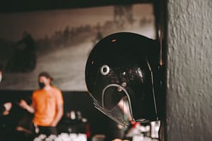 A motorbike helmet displayed on a wall