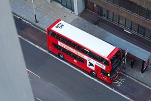 An aerial photo of a double decker bus