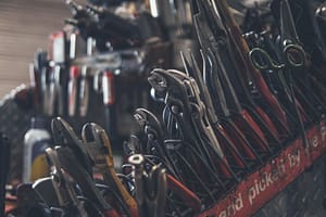 A collection of tools in a car garage