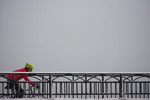 Someone cycling with a helmet on