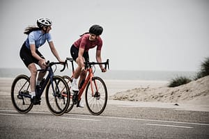 Two people cycling