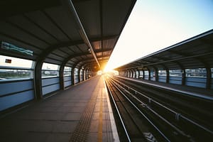 a train platform at sunrise