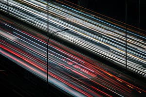 Blurred headlights on a busy road