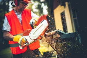 man using metal cutter