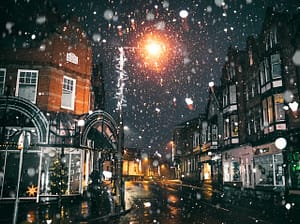 Snowfall on a dark street