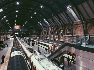 A train station with busy platforms