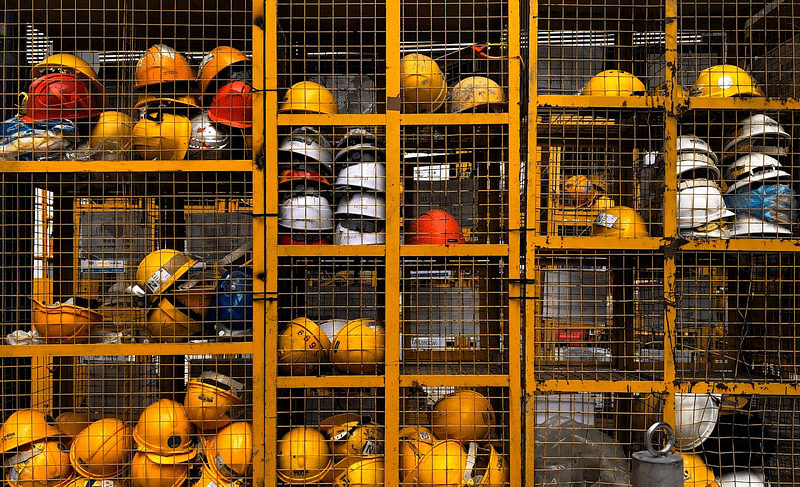 Hard hats in a cage