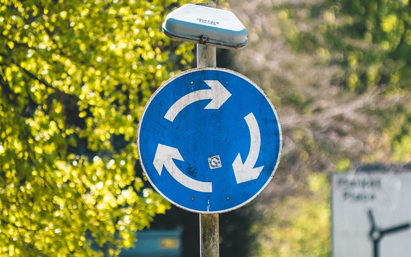 blue UK roundabout sign