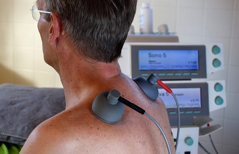 Someone receiving treatment in a hospital for their back