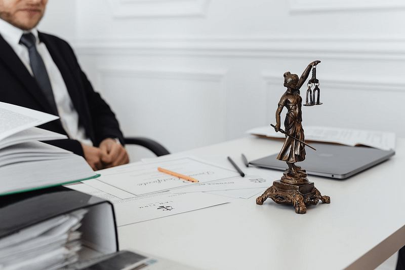 A lawyer behind his desk