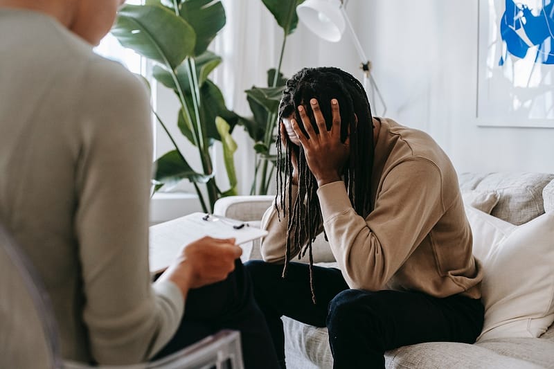 Man looking stressed in therapy