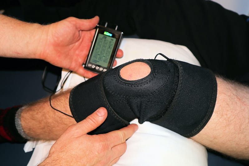 Person getting physiotherapy on their knee