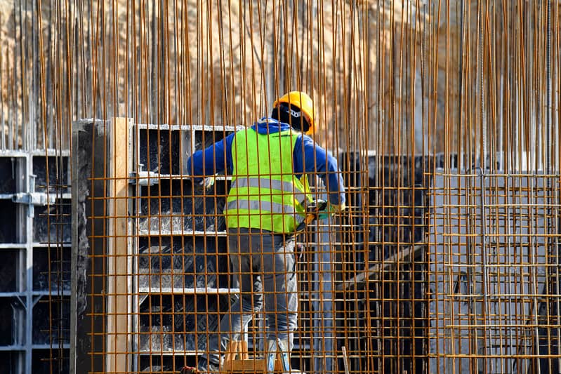 A builder lifting materials