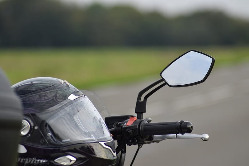 helmet resting on a motorbike