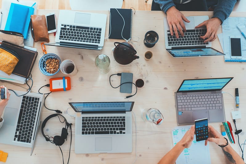 Group of people working at a desk