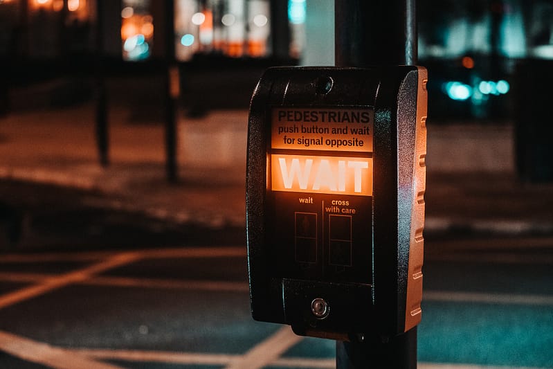 A pedestrian crossing at night