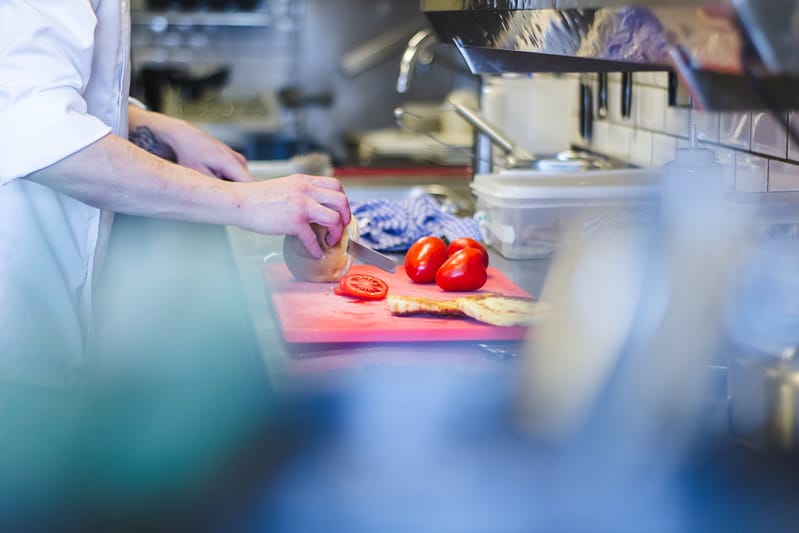 A chef preparing vegetables