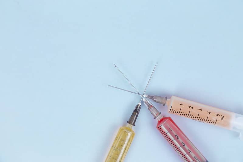 three different syringes