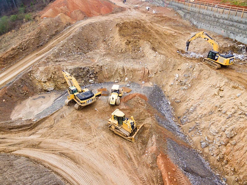 Three diggers working on site