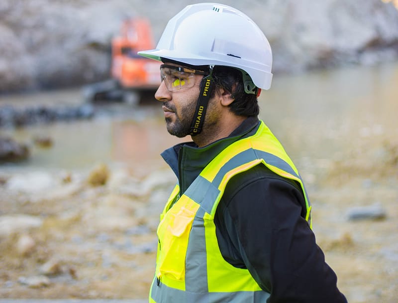 Someone wearing PPE on a construction site